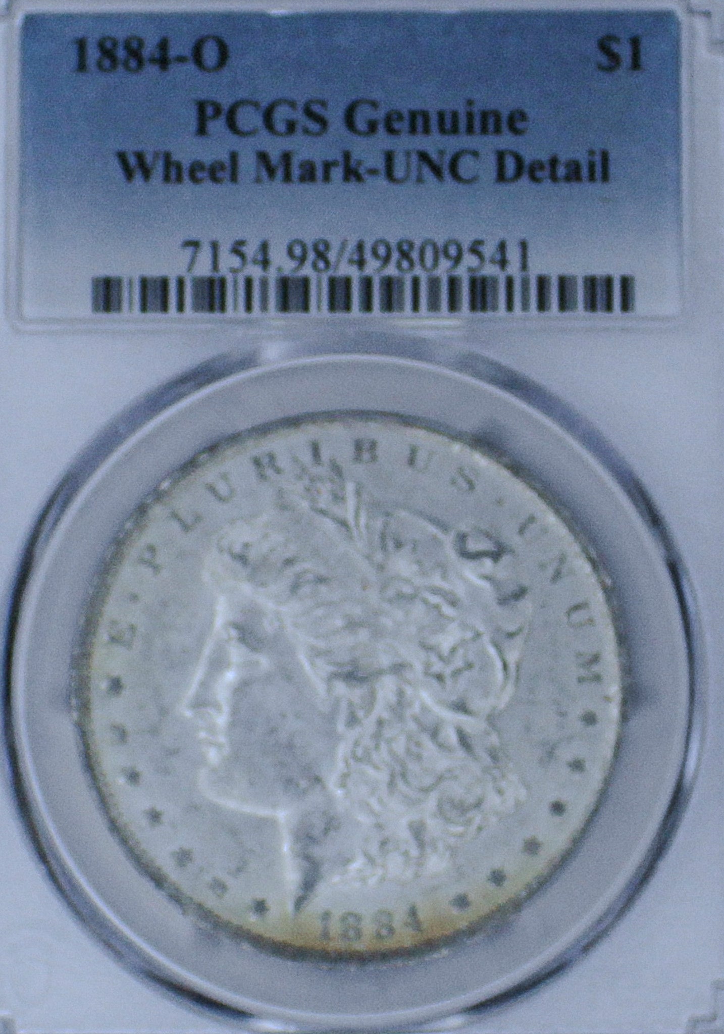 1884-O Morgan Silver Dollar Genuine Wheel Mark-UNC Detail